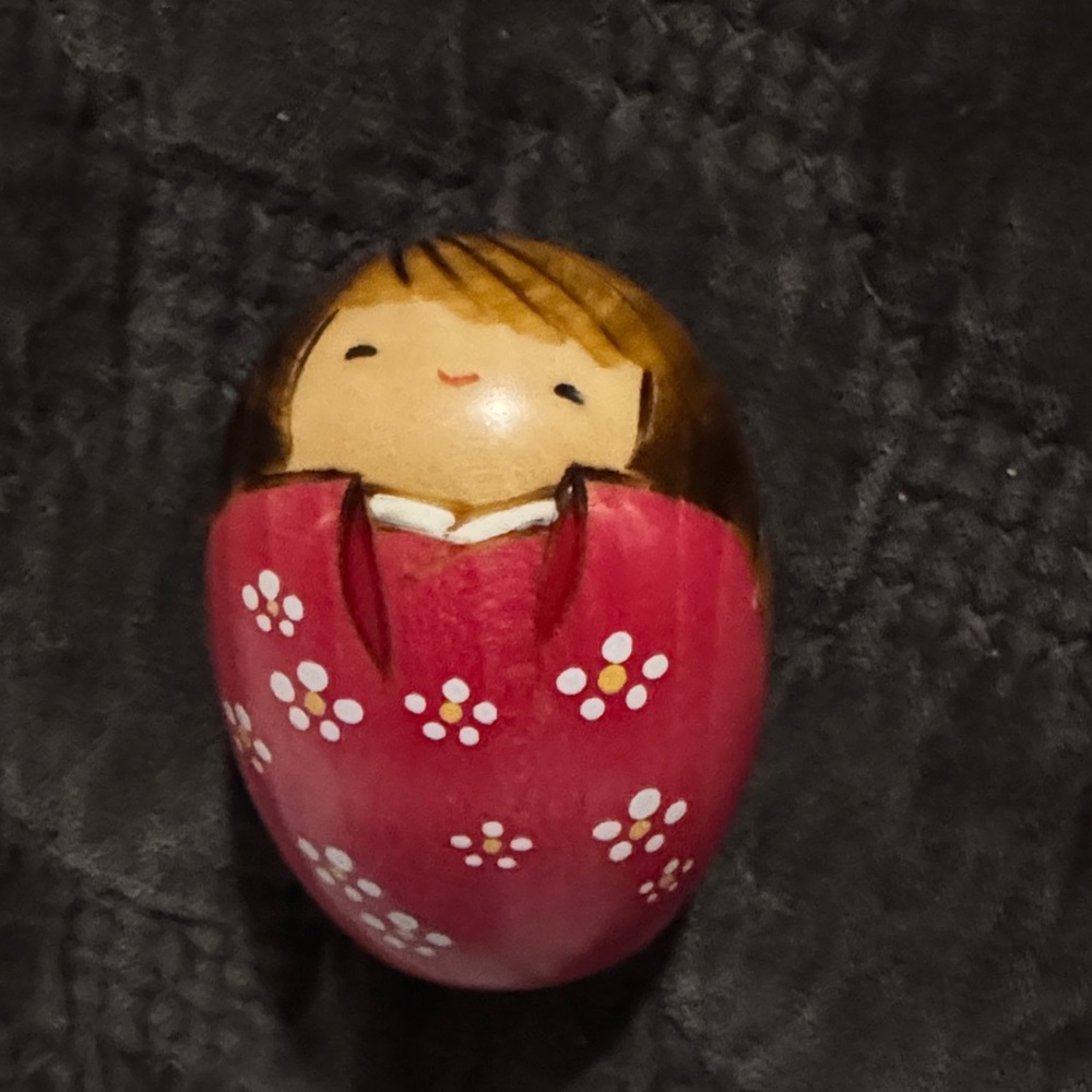Hand-Painted Japanese kokeshi egg shaped doll in pink floral dress.
